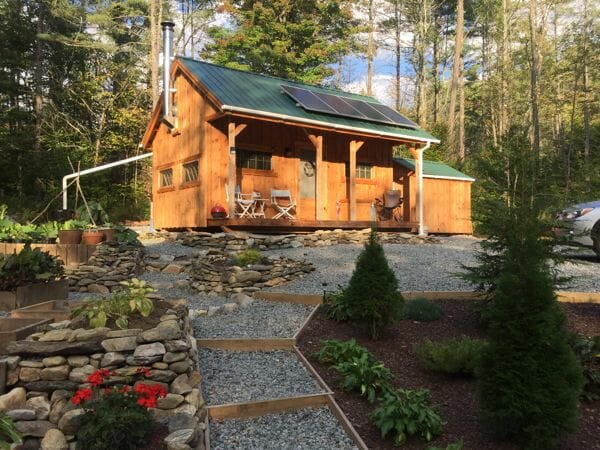 This 16x20 Vermont Cottage is being used as a post and beam, off-grid cabin in New England