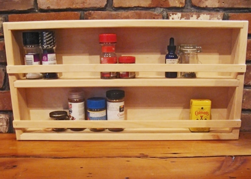Spice Rack made from high quality Pine is left unfinshed.  Overall dimensions 24"Wx12"Hx2.75"D.