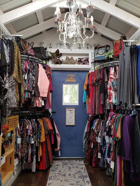 This 8x16 Garden Shed was converted into a tiny store that sells vintage clothing. 