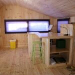 This insulated storage shed is being used as a backyard recording and practice studio for musicians.