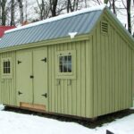 Saltbox Storage Shed painted green with dark gray roof.