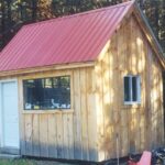 Hobby House with autumn red roof and custom millwork