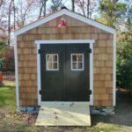 10x14 New Yorker Option B storage shed with siding and door upgrades