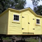 10x14 Tool Shed with clapboard siding and painted yellow