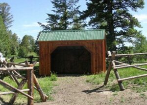 The Standard Run In is a portable horse barn that can be pulled around a pasture