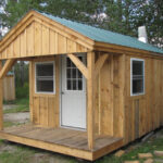 Custom built insulated prefab cabin with woodstove flashing.