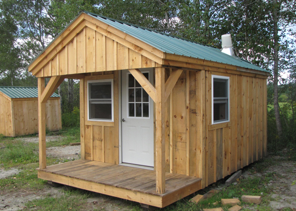 Custom built insulated prefab cabin with woodstove flashing.