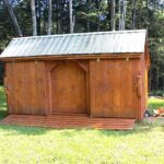 10x16 Three Sled Shed shown with stain