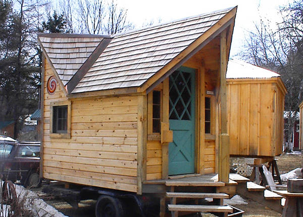 12x16 Backyard Retreat with Cedar Shingle Roof, Novelty Pine Siding, Antique Door and Extra Windows