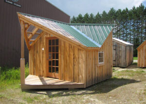 12x16 Backyard Retreat customized with a 15-lite insulated wood door