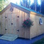 12x16 Gable - a storage shed kit that includes the floor system, double door with ramp, pine board and batten siding, two hinged windows and a corrugated metal roof.