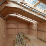 12X20 Three Sled Shed Interior - Customized with Clearpoly Roof Panels