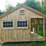 12x20 Gibraltar cottage includes board and batten pine siding, hinged windows, wood louvered vent and and a 4x20 porch.