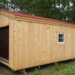 14x20 Barn Garage with brown overhead door, window and red roof