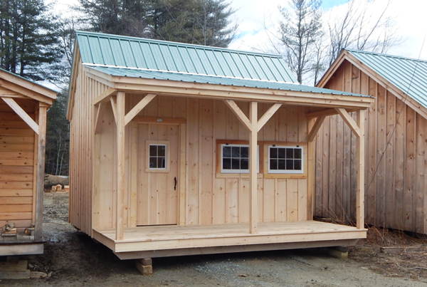 This one room cabin, with a loft and porch, can be built with one of our pre-cut kits