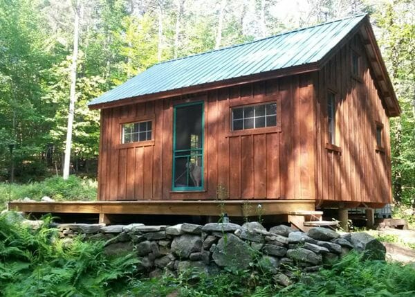 16x20 Vermont Cottage B post and beam cabin with pine board and batten siding