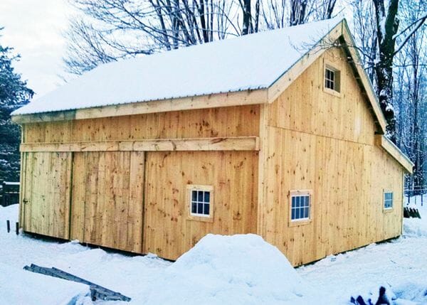 20x30 Two Bay Garage with sliding barn doors, extra windows and enclosed overhang