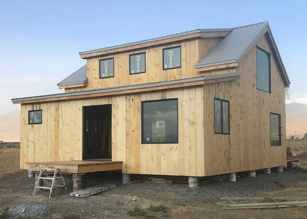 j600 square foot cabin with an addition and shed dormer.