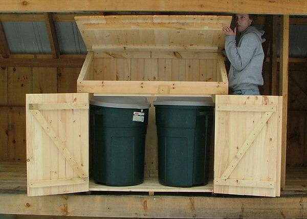 Two large trash cans fit inside this 2x4 Garbage Bin