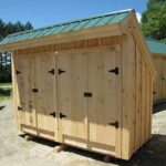 4x10 Garbage Shed with two pine double doors and pine board and batten sidnig.