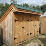 4x10 Garbage Shed with evergreen metal roof and double doors