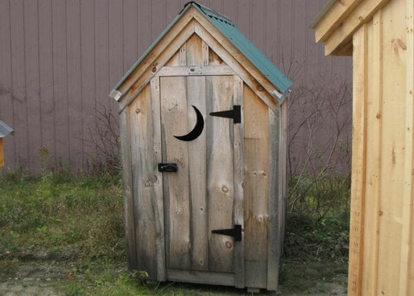 4x4 Outhouse Shed includes green metal roof, pine board and batten siding and a single door with moon cutout