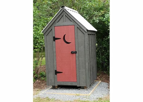 4x4 Outhouse Shed custom built with white metal roof. The siding was painted brown and the door was painted red.