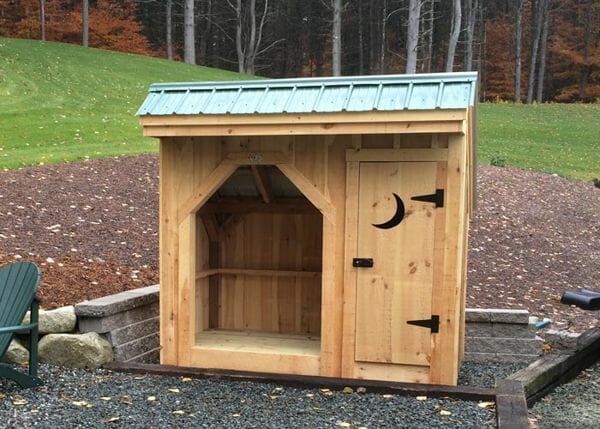 4x8 Weekender firewood storage shed with crescent moon door cut out