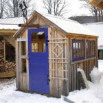6x8 Greenhouse with blue door, blue hinged windows and other decorative details
