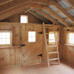12x20 Bunkhouse with barn sash windows, loft, ladder, solid pine door with window and 3/4" cdx plywood decking.