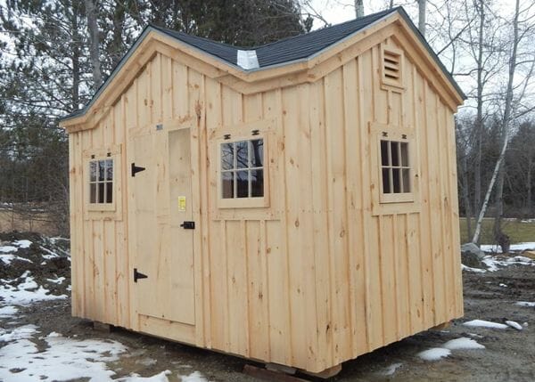 8x12 Cross Gable with asphalt shingle roof, extra barn sash windows and a single pine door