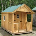 8x12 Nook post and beam cabin with porch. Porch railing and half newel posts were an add-on