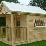 8x12 Garden Shed with porch railing, larger windows, clapboard siding and clearpoly roof
