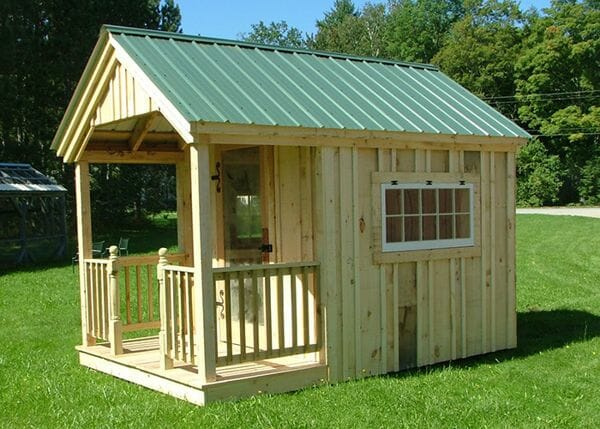 8x12 Garden Shed with porch railing with half newel posts, screen door and 4x2 hinged barn sash windows