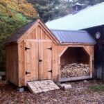 8x14 Vermont Gem - firewood storage shed with enclosed area placed on the left. Gray roof upgrade shown