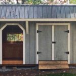 8x14 Weston Potting Shed painted gray with white trim and Charcoal Gray Roof