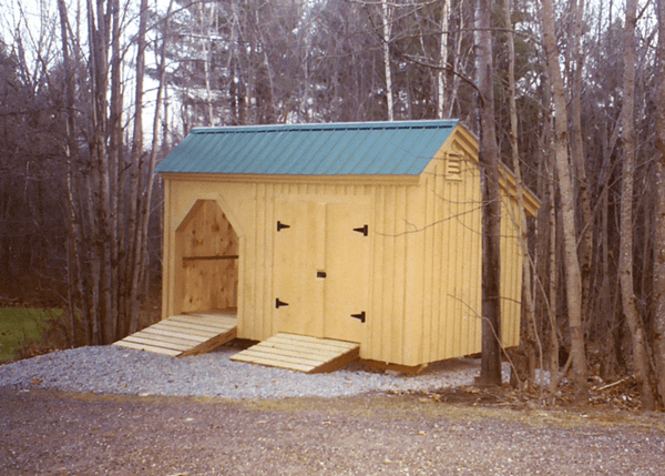 8x16 Weekender combination storage shed and firewood bin with an extra ramp