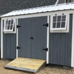 6x12 Nantucket - customized with alternative window placement, silver roof and paint