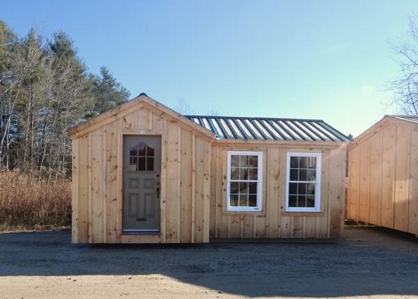 8x18 Heritage converted into a tiny house with antique door and insulated windows