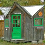 This little post and beam cabin makes a great play house or pool house