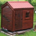 6x8 Natnucket garden shed with log cabin siding and an autumn red roof