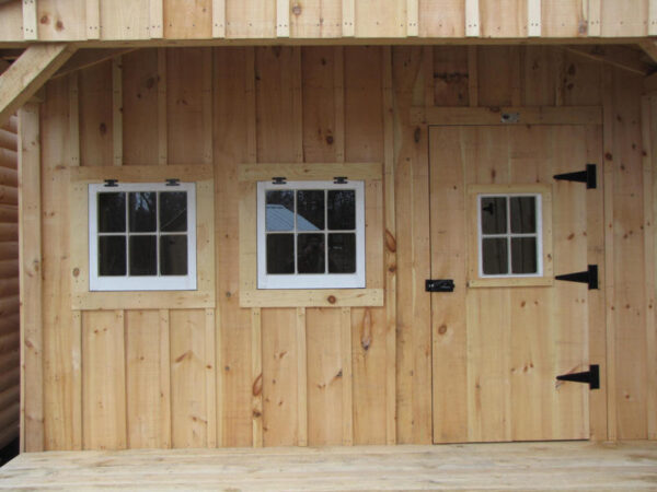 2-8 JCS Built 2" thick Pine Single Door with 16"x21" Fixed Window on 12x12 Potting Fort.  Exterior view.