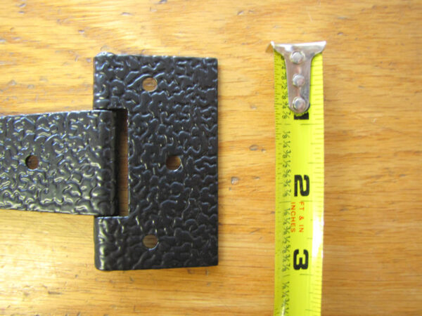 The base of the hinge is approximately 3" wide.