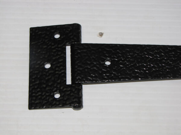 The base of the ornamental hinge has three pre-drilled holes for mounting.