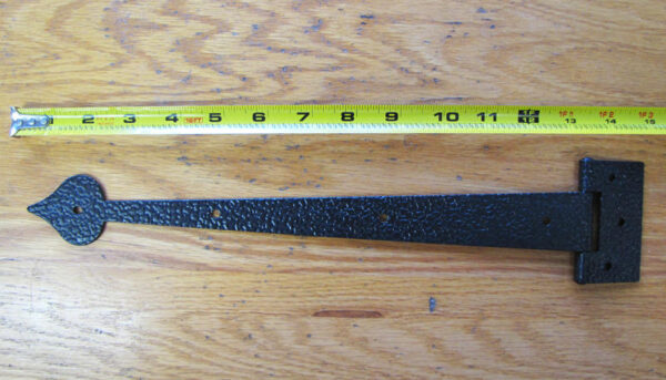 This black hammered steel hinge is fifteen inches long