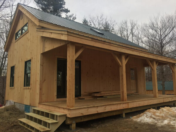Porch kit for addition of covered porch using 8x8 Post & Beam construction.