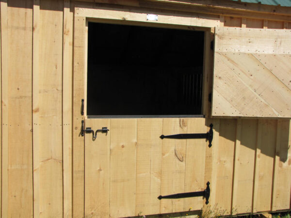 4-0 JCS Built 2" thick Pine Dutch Door on 10x20 Two Stall Barn.  Exterior view. Black Drop Latch.