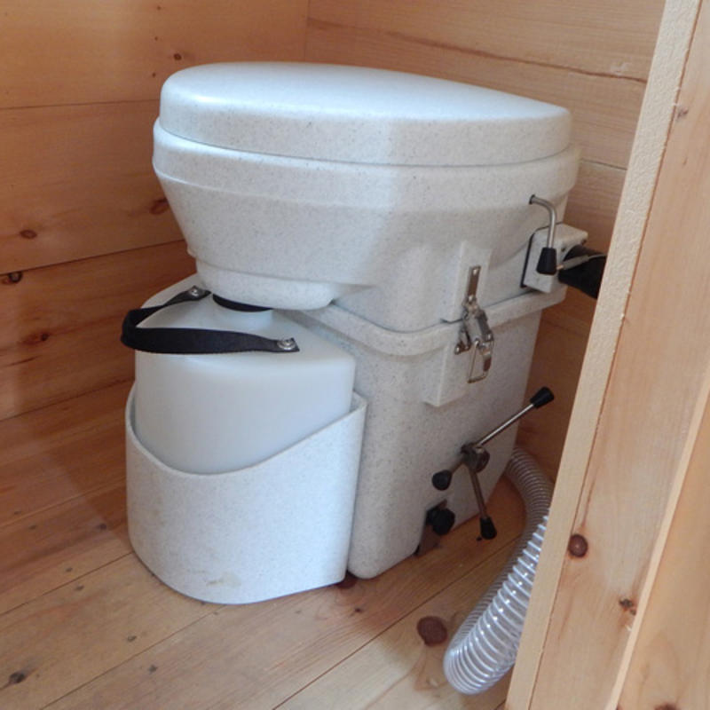 Nature's Head Composting Toilet with Stainless Steel hardware.  Self Contained, compact & waterless off-grid toilet option. 