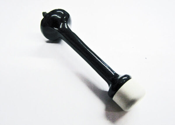 The rubber tip on this black metal door stopper prevents damage to doors and walls.