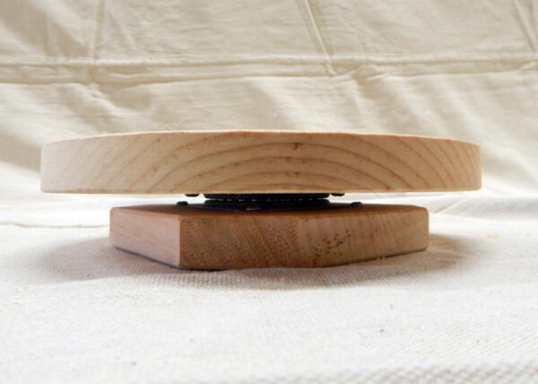 This wooden lazy susan is handcrafted from high-quality pine.